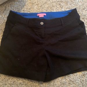 Black shorts finger tip length
